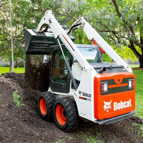 stand on skid steer bobcat|bobcat skid steer with tracks.